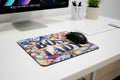 Mouse pad with 'BOSS LADY' text and decorative elements on a white surface.