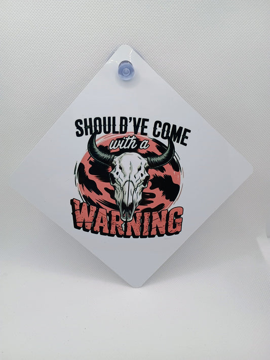 Car window sign~Should have come with a warning