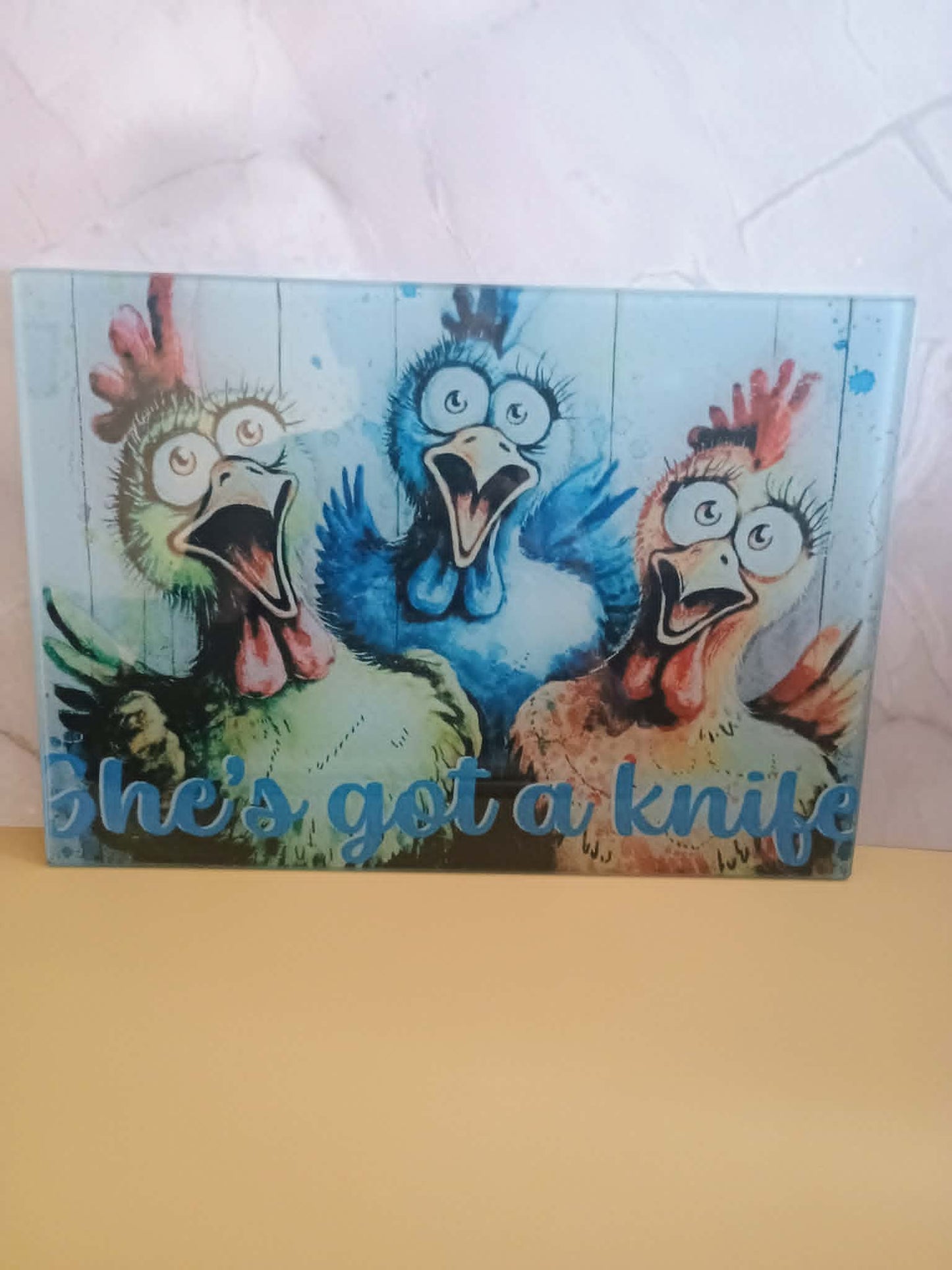 Glass cutting board~She's got a knife